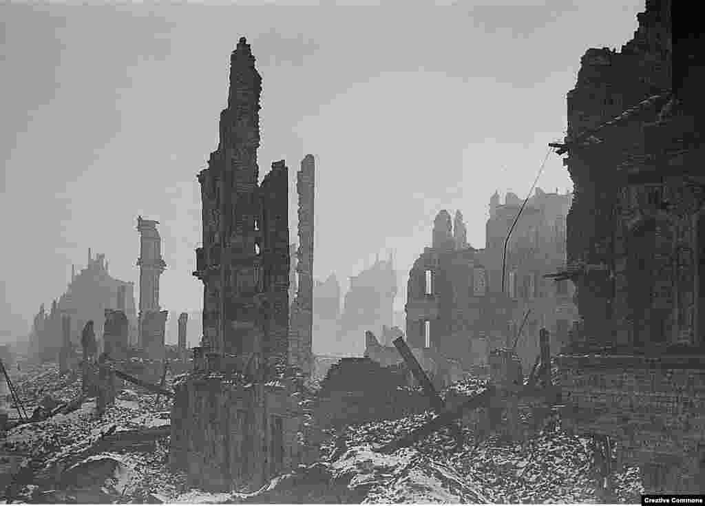 Stumps of buildings stand in Dresden's city center. A British prisoner of war who was in the city during the firebombing recalled that while charred adult bodies could be seen throughout the rubble, there was little left of the children because "their bones were too tender and they just melted." 
