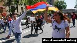 Opposition supporters rally in Yerevan on April 26.