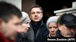 Nils Usakovs attends a rally in front of Riga City Hall on February 9.