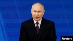 Speaking delivers his annual state-of-the-nation address to Russians on February 29.