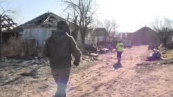 Ukrainian Villager Recounts Russian Mass Destruction, Looting In Kharkiv Region

