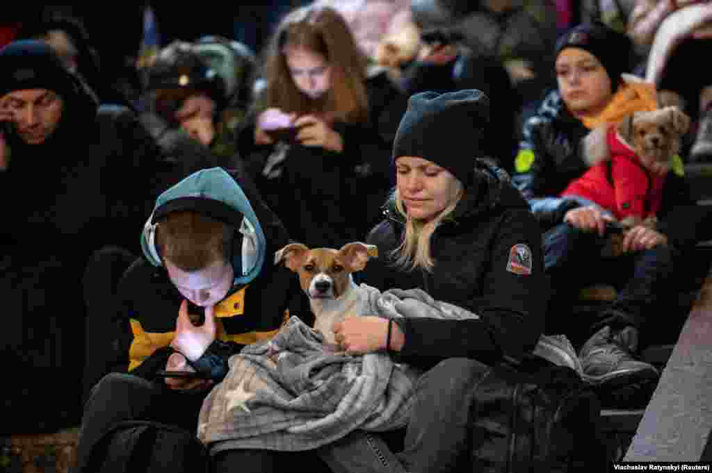 People take shelter inside a subway station during massive Russian missile attacks against Ukraine in Kyiv on February 10.