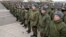 Russian conscripts line up at an assembly station in Kazan following Russian President Vladimir Putin's announcement of a partial military mobilization in September. 