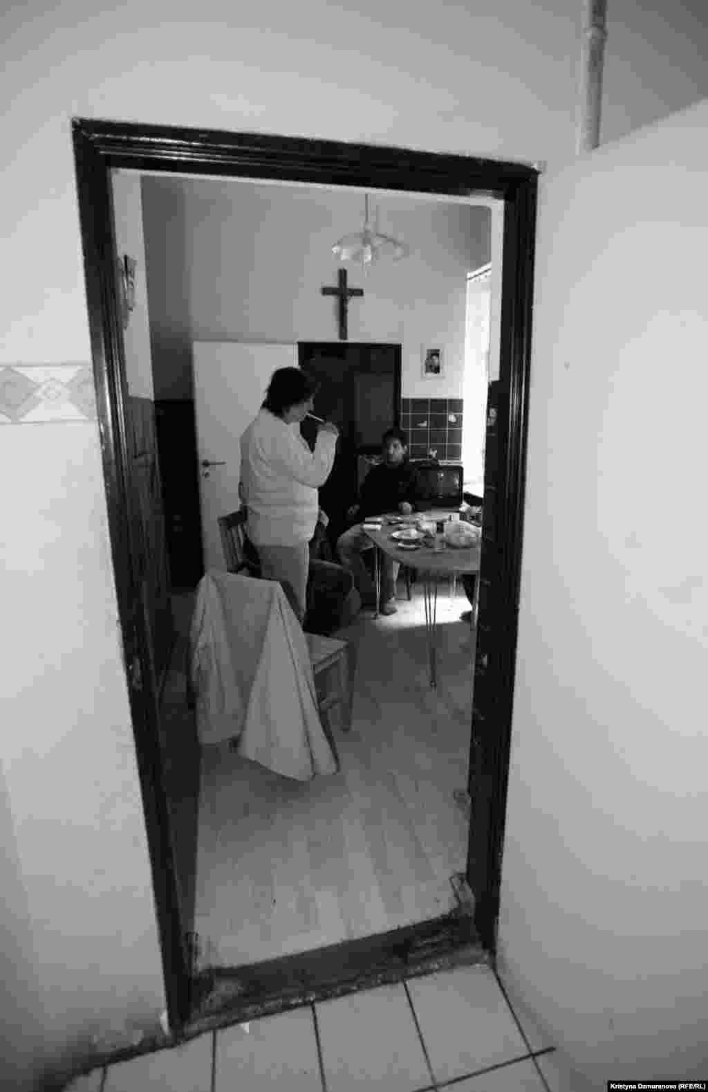 Six family members ranging from age 5 to 82 live in this small 3-bedroom apartment. Much of the apartment is empty during the day, when the family tends to gather around the kitchen table.