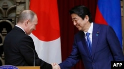 Vladimir Putin dhe Shinzo Abe