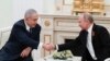 Russian President Vladimir Putin (R) meets with Israeli Prime Minister Benjamin Netanyahu at the Kremlin in Moscow, May 9, 2018