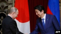 آرشیف، رهبران جاپان و روسیه