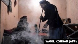 افغانستان کې د نشه‌يي توکو د پروسس يوه کارخونه، ارشيف