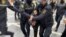 At least 20 demonstrators were detained by officers during the December 15 rally in Baku.
