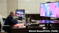 Președinții Vladimir Putin și Xi Jinping