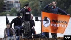 Members of the German Pirate Party sail on the Spree River during a "campaign rally" in Berlin. (file photo) 