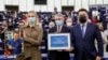 Leonid Volkov (right) poses with Aleksei Navalny's daughter Daria Navalnaya (left) and European Parliament President David Sassoli during the award ceremony for the Sakharov Prize at the European Parliament in Strasbourg, France, on December 15, 2021.