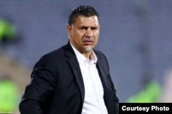 Iranian soccer player Ali Daei, who won the Bundesliga with Bayern Munich and retired in 2007 as the world's all-time top international goal scorer, hitting the net 109 times for his country in 149 appearances. (file photo)