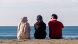 Afghans fleeing terror enjoy Albania's beaches