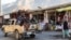 Taliban soldiers fighters ride through town in a pickup truck in Panjshir in December 2021.