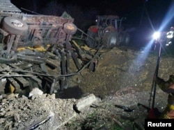 Место попадания ракеты в польском селе Пшеводув 15 ноября, в результате чего погибли два человека