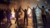 Iranian youths protest in the western city of Sanandaj on November 16.