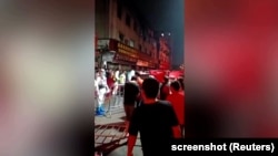 Captură dintr-un videoclip apărut pe rețelele sociale despre protestele care au avut loc în orașul chinez Guangzhou.