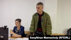 Kazakh soldier Mark Zlunyaev in court in Almaty on November 16.