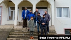 Ethnic Serbs hold a picket on the steps of an office for Serb self-government in the southern Kosovar village of Verboc earlier this month. 