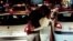 Two people kissing in public in Iran