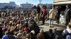 A banner that states &quot;Russians and Ukrainians are one people, one whole&quot; is torn down in the newly liberated city of Kherson on November 14.<br />
<br />
Kherson&#39;s residents are facing shortages of electricity and water as winter looms.