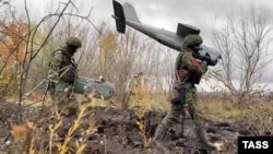 Russian soldiers carry out a mission involving the use of an Orlan-10 unmanned aerial vehicle. (file photo)