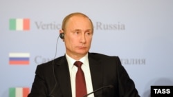 Italy -- Russia's president Vladimir Putin pictured during a joint press conference with Italy's prime minister Enrico Letta, Trieste, November 26, 2013.