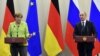 Putin Speaks With Trump By Phone, Meets Merkel In Sochi