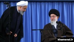 President Hassan Rouhani (L) and Supreme Leader Ali Khamenei. File photo