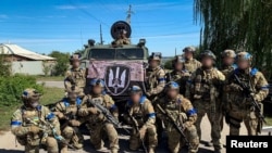 Украинские военнослужащие в освобожденном Купянске.