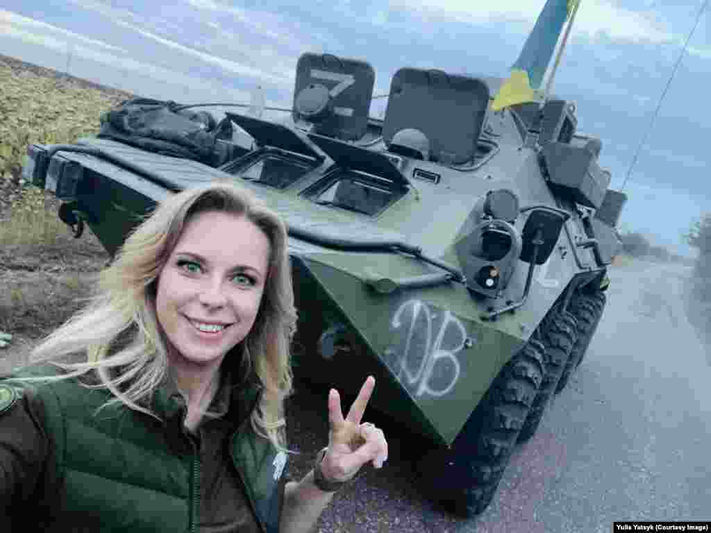 Ukrainian politician&nbsp;Yulia Yatsyk poses with a captured Russian vehicle in the Kharkiv region in a photo posted to her Facebook page on September 11.&nbsp;