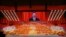Chinese President Xi Jinping appears on a large screen in Beijing during the celebration of the 100th anniversary of China's Communist Party in June 2021.