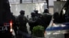 Members of a police special unit enter the Iranian Embassy in Tirana after Albania cut ties with Iran and ordered diplomats to leave over a cyberattack it blamed on Tehran on September 8.
