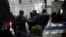 Members of a police special unit enter the Iranian Embassy in Tirana after Albania cut ties with Iran and ordered diplomats to leave over a cyberattack it blamed on Tehran on September 8.