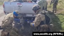 Скріншот із відео про взяття, як повідомляється, у полон громадянина Узбекистану, що приїхав в Україну воювати на боці РФ