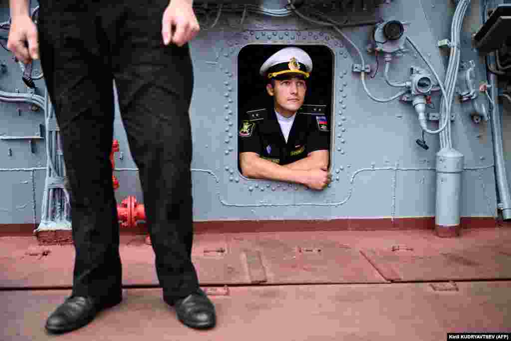 Sailors on Russia&#39;s Marshal Shaposhnikov anti-submarine destroyer take part in&nbsp; &#39;Vostok-2022&#39; military exercises near Vladivostok.&nbsp;