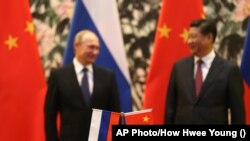 تصویر از دیدار رهبران چین و روسیه در ازبکستان 