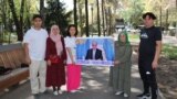 Protesters with relatives believed to be imprisoned in Beijing’s camp system in Xinjiang hold a small gathering in Almaty on September 5.
