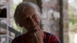 Ukrainian Librarian, 81, Salvages Books From Ruined School As New Academic Year Begins