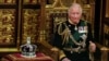 Regele Charles al III-lea al Marii Britanii în timpul ceremoniei anuale de deschidere Parlamentului, la Palatul Westminster din Londra, 10 mai 2022 (Notă: presa din România a preferat variantă în limba engleză a numelui său, în detrimentul celei românești: Carol). 