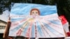 A poster drawn by participants in a Kyrgyz rally protesting violence against women and girls on July 8.