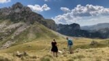 Tourists hiking on Durmitor mountain, Montenegro