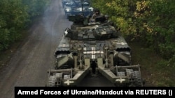 Blindate ucrainene în timpul contraofensivei din regiunea Harkov, 12 septembrie 2022. 