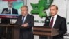 Speaking on November 7 at the COP27 climate conference alongside UN Secretary-General Antonio Guterres (left), Prime Minister Shehbaz Sharif (right) said Pakistan's escalating public debt was hampering its recovery. (file photo)