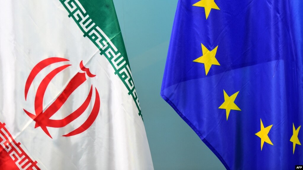 پرچم‌های اتحادیه اروپا و جمهوری اسلامی ایران؛ عکس از آرشیو