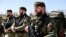 Soldiers undergo a troops review at the residence of leader Ramzan Kadyrov in Russia's North Caucasus region of Chechnya in March.