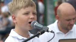 Eight-Year-Old Sings On Lviv Streets To Raise Money For War