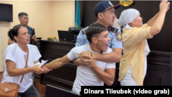 The scuffles broke out after a court verdict was announced in Shymkent on September 8. 