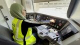 Cairo, Egypt -- One of the first two female drivers of the Cairo metro in the cabin of the train